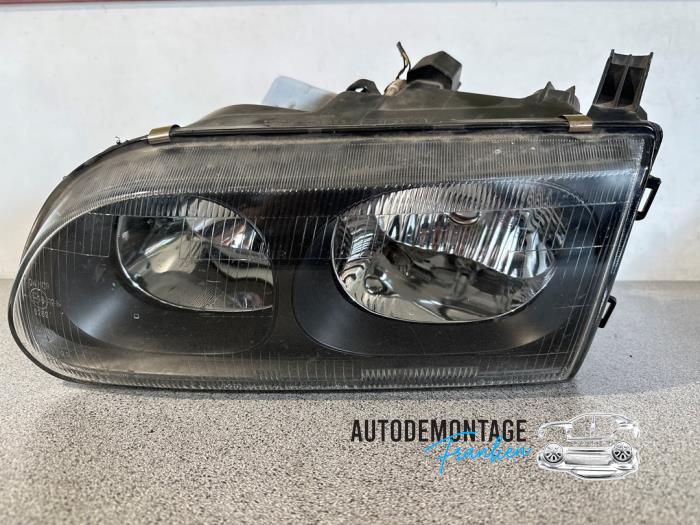 Używane Reflektor prawy Mitsubishi L-400 2.5 TD Cena € 35,00 Procedura marży oferowane przez Franken Autodemontage B.V.