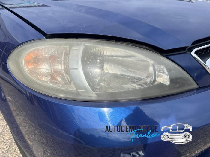 Używane Reflektor prawy Chevrolet Lacetti (KLAN) 1.4 16V Cena na żądanie oferowane przez Franken Autodemontage B.V.