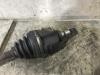 Front drive shaft, left from a Toyota Corolla (E11) 1.3 16V 1999