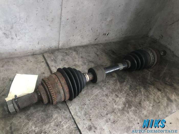Front drive shaft, left from a Opel Agila 2005