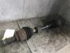 Front drive shaft, left from a Opel Agila 2005