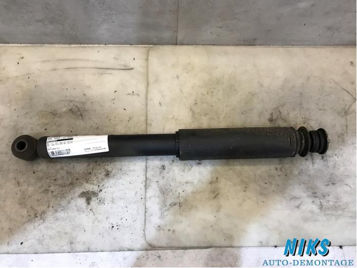 Rear shock absorber, left from a Opel Corsa C (F08/68) 1.4 16V 2002