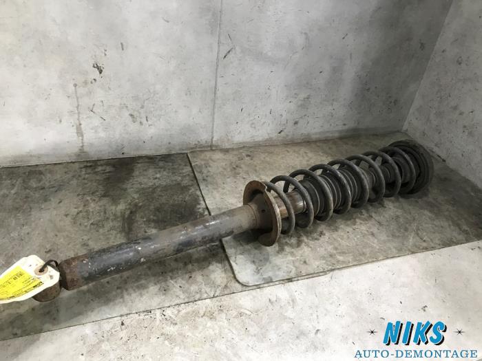 Rear shock absorber rod, left from a Renault Twingo (C06) 1.2 1997