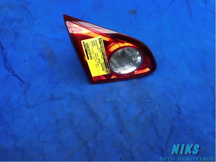 Taillight, left from a Nissan Qashqai (J10) 2.0 dCi 4x4 2009