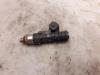 Injector (petrol injection) from a Ford Fiesta 6 (JA8) 1.25 16V 2010