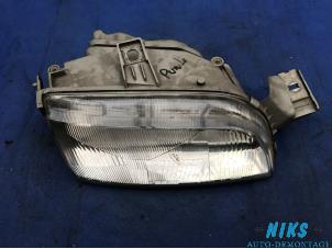 Used Headlight, right Fiat Punto Price on request offered by Niks autodemontage