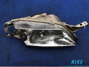 Used Headlight, right Mazda 626 (GF12) 2.0i 16V GLX Price on request offered by Niks autodemontage