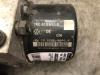 ABS pump from a Volkswagen Touran (1T1/T2) 1.9 TDI 100 2003