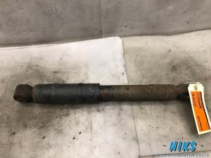 Used Rear shock absorber, left Opel Astra Price on request offered by Niks autodemontage