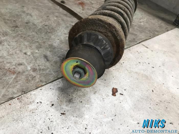Rear shock absorber rod, right from a Seat Ibiza II (6K1) 1.6 2000