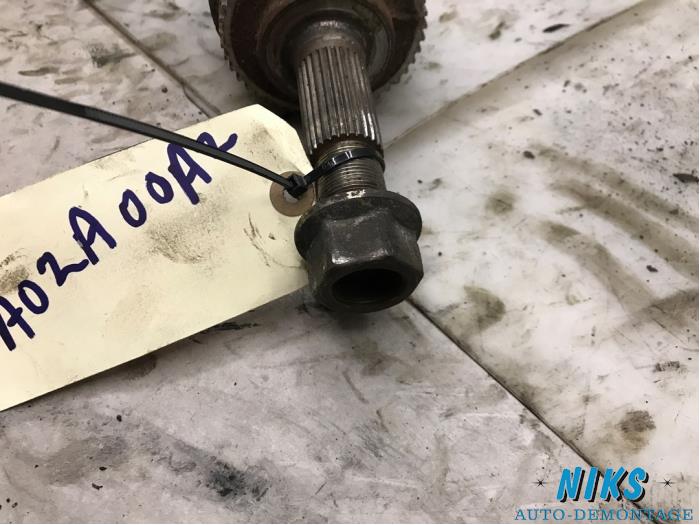 Front drive shaft, left from a Nissan Primera Wagon (W12) 1.9 dCi 2005
