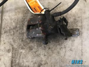 Used Rear brake calliper, right Nissan Almera (N16) 1.5 16V Price on request offered by Niks autodemontage