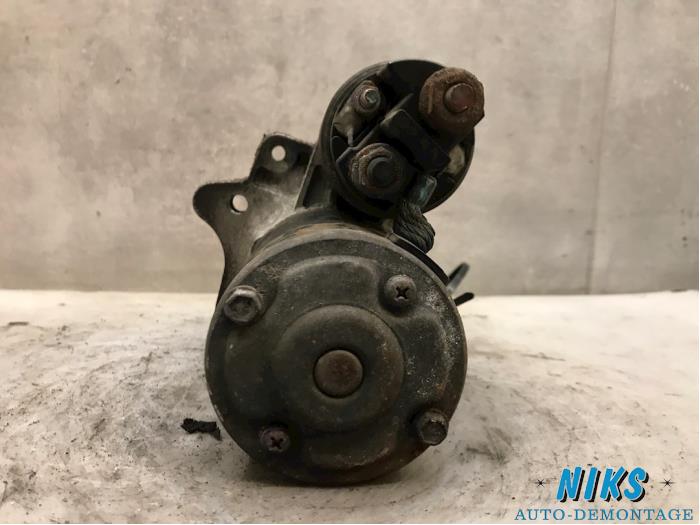 Starter from a Renault Clio III (BR/CR) 1.6 16V 2006