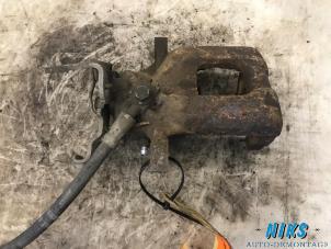 Used Rear brake calliper, right Volkswagen Jetta IV (162/16A) 1.6 TDI 16V Price on request offered by Niks autodemontage