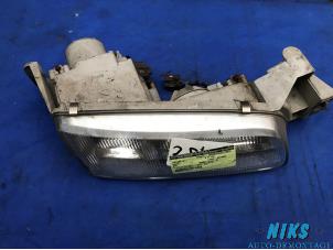 Used Headlight, right Mazda 626 (GE14/74/84) 1.8i LX,GLX 16V Price on request offered by Niks autodemontage