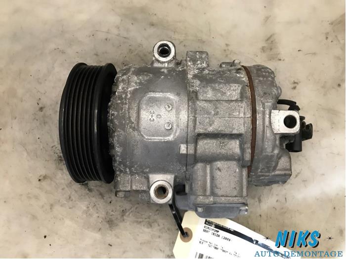 Air conditioning pump from a Seat Ibiza IV (6J5) 1.9 TDI 105 2009