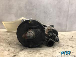 Starter from a Audi A4 Avant (B8) 2.0 TDI 143 16V 2012