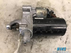 Starter from a Audi A4 Avant (B8) 2.0 TDI 143 16V 2012