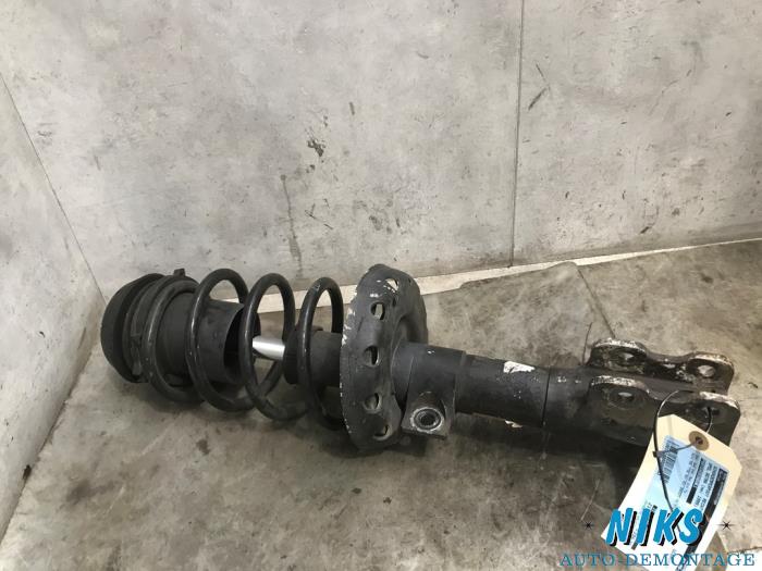 Front shock absorber rod, right from a Opel Astra G Caravan (F35) 1.8 16V 1999