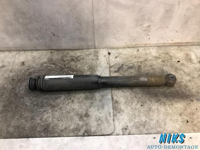Rear shock absorber, left from a Opel Corsa C (F08/68) 1.4 16V Twin Port 2004