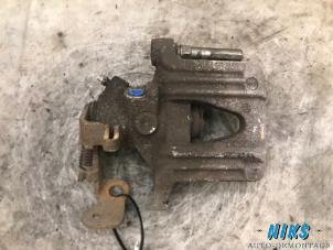 Used Rear brake calliper, right Opel Astra G (F07) 1.8 16V Price on request offered by Niks autodemontage