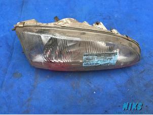 Used Headlight, right Mitsubishi Colt (CA/CC) 1.6 i GL,GLX 16V Price on request offered by Niks autodemontage