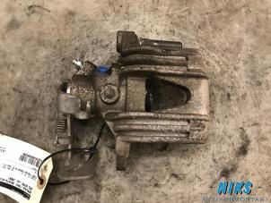 Used Rear brake calliper, right Opel Astra G Caravan (F35) 1.8 16V Price on request offered by Niks autodemontage