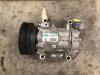 Air conditioning pump from a Renault Clio III (BR/CR) 1.2 16V 65 2006