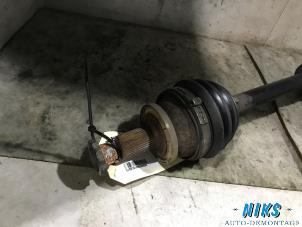 Used Front drive shaft, left Volkswagen Polo IV (9N1/2/3) 1.4 16V Price on request offered by Niks autodemontage