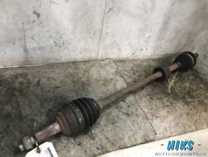 Used Front drive shaft, right Daihatsu Cuore (L251/271/276) 1.0 12V DVVT Price on request offered by Niks autodemontage