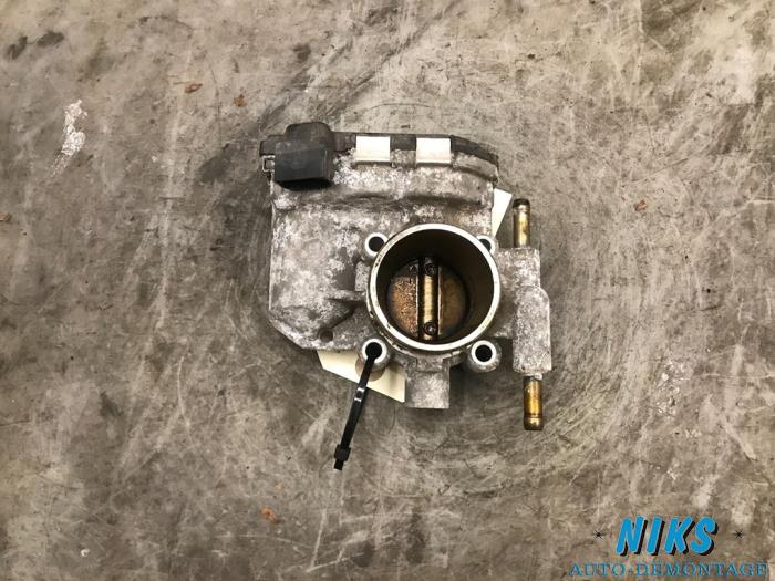 Throttle body from a Opel Corsa D 1.2 16V 2010