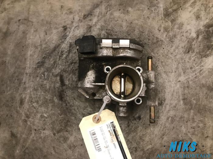 Throttle body from a Opel Astra H (L48) 1.4 16V Twinport 2004
