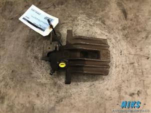 Used Rear brake calliper, left Volkswagen Golf III Cabrio Restyling (1E7) 2.0 Price on request offered by Niks autodemontage
