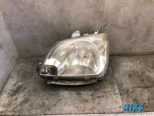 Used Headlight, left Daihatsu Cuore (L251/271/276) 1.0 12V DVVT Price on request offered by Niks autodemontage