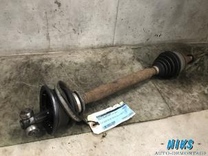 Used Front drive shaft, left Renault Scénic I (JA) 1.6 16V Price on request offered by Niks autodemontage