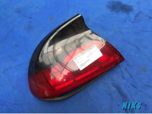 Used Taillight, left Opel Tigra (75) 1.4i 16V Price on request offered by Niks autodemontage