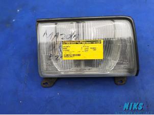 Used Headlight, right Mazda E-Klasse Price on request offered by Niks autodemontage