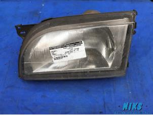 Used Headlight, left Ford Transit 100 2.5Di Price on request offered by Niks autodemontage