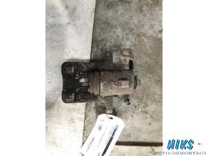 Used Rear brake calliper, left Volkswagen Golf IV (1J1) 1.4 16V Price on request offered by Niks autodemontage