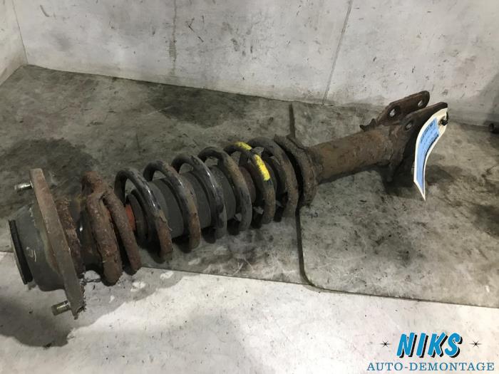 Front shock absorber rod, left from a Opel Agila (A) 1.2 16V 2003