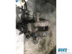 Used Rear brake calliper, left Opel Meriva 1.4 16V Ecotec Price on request offered by Niks autodemontage