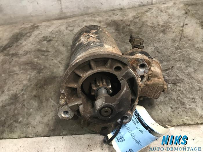 Starter from a Seat Arosa (6H1) 1.0 MPi 2002