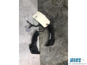 Used Steering wheel mounted radio control Nissan NV 200 (M20M) 1.5 dCi 90 Price on request offered by Niks autodemontage