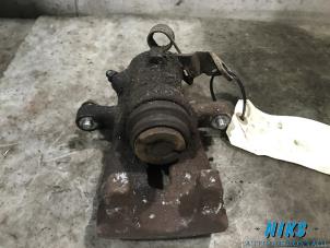 Used Rear brake calliper, right Opel Astra H SW (L35) 1.7 CDTi 16V Price on request offered by Niks autodemontage