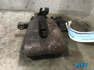 Used Rear brake calliper, left Opel Meriva 1.4 16V Twinport Price on request offered by Niks autodemontage