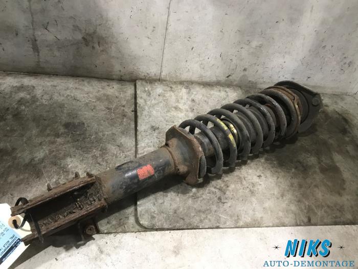 Front shock absorber rod, left from a Opel Agila (A) 1.2 16V Twin Port 2005