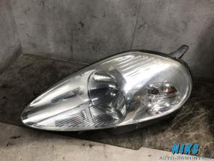 Used Headlight, left Fiat Punto III (199) 1.4 Price on request offered by Niks autodemontage