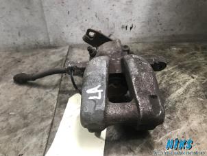 Used Rear brake calliper, left Fiat Punto III (199) Price on request offered by Niks autodemontage