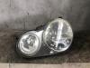 Headlight, left from a Volkswagen Polo IV (9N1/2/3), 2001 / 2012 1.4 16V, Hatchback, Petrol, 1.390cc, 55kW (75pk), FWD, BBY, 2001-09 / 2007-05, 9N1; 2 2004