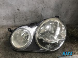Used Headlight, left Volkswagen Polo IV (9N1/2/3) 1.2 12V Price on request offered by Niks autodemontage